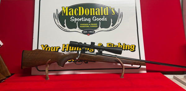 Tikka LSA-55 257 Roberts Improved w/4-12x Vanquish